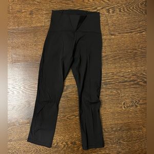 Lululemon legging with mesh calf panels. Size 4. Excellent condition.